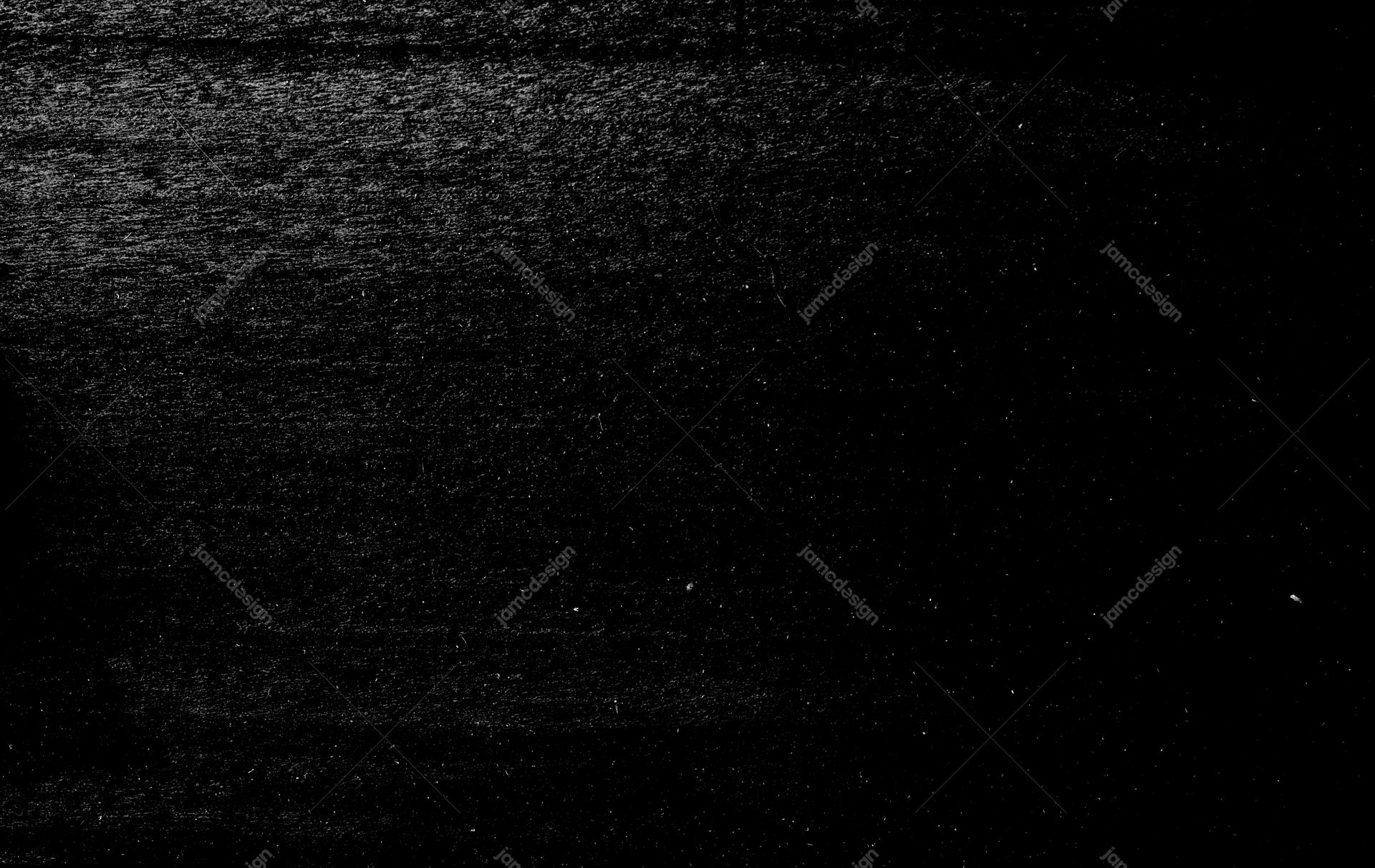 Black Grained Texture With Scuffs PNG. This black grunge grain texture PNG has a distressed monochrome surface with rough scuffs and scattered speckles