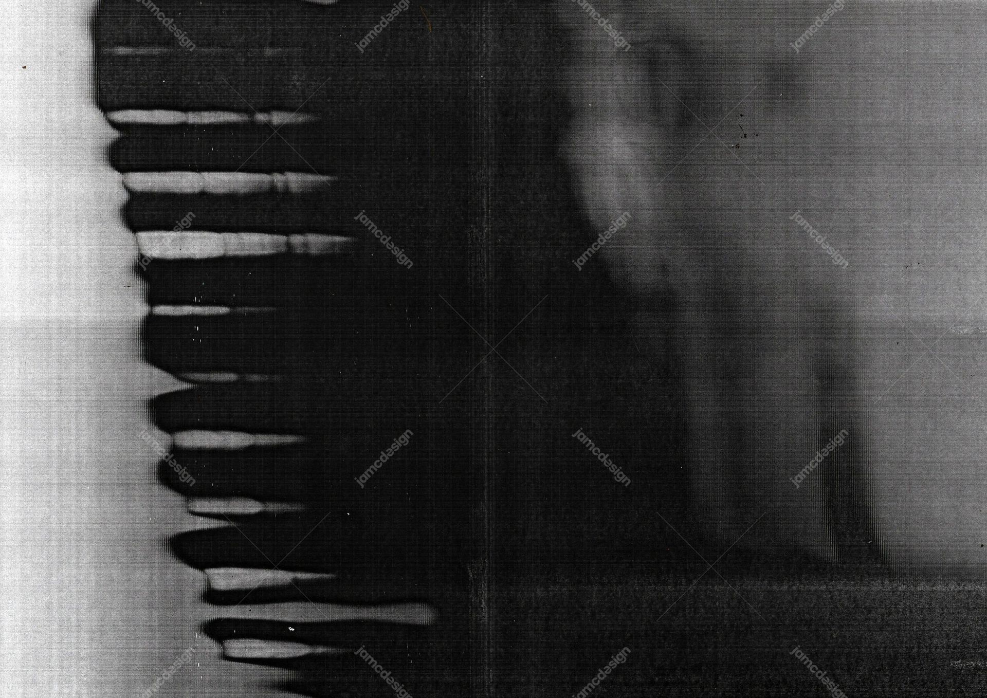 Dark Monochrome Texture With Vertical Blur. This monochrome JPG texture combines a dark field, fine grain and blurred streaks with irregular pale bands along