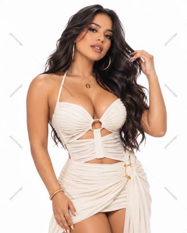 Studio Portrait Of Latina Woman In White Outfit