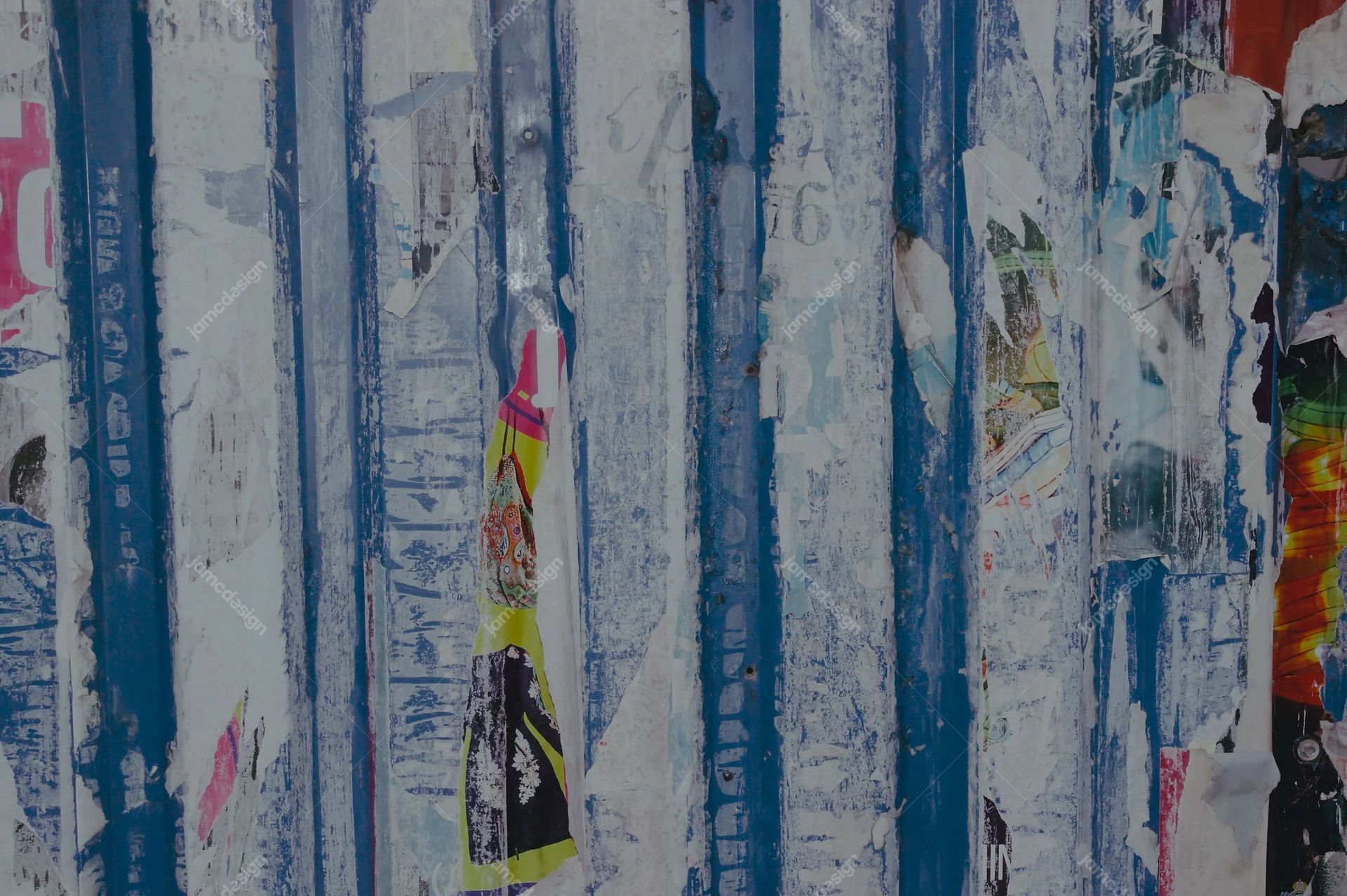 Distressed Wall Texture With Torn Paper Strips. This JPG texture shows a distressed wall layered with torn paper strips and blue painted lines