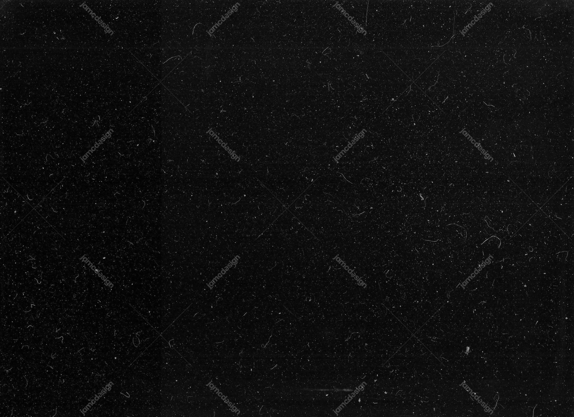 Near-Black Distressed Speckle Texture Background. This JPG texture shows a near black surface scattered with fine pale speckles