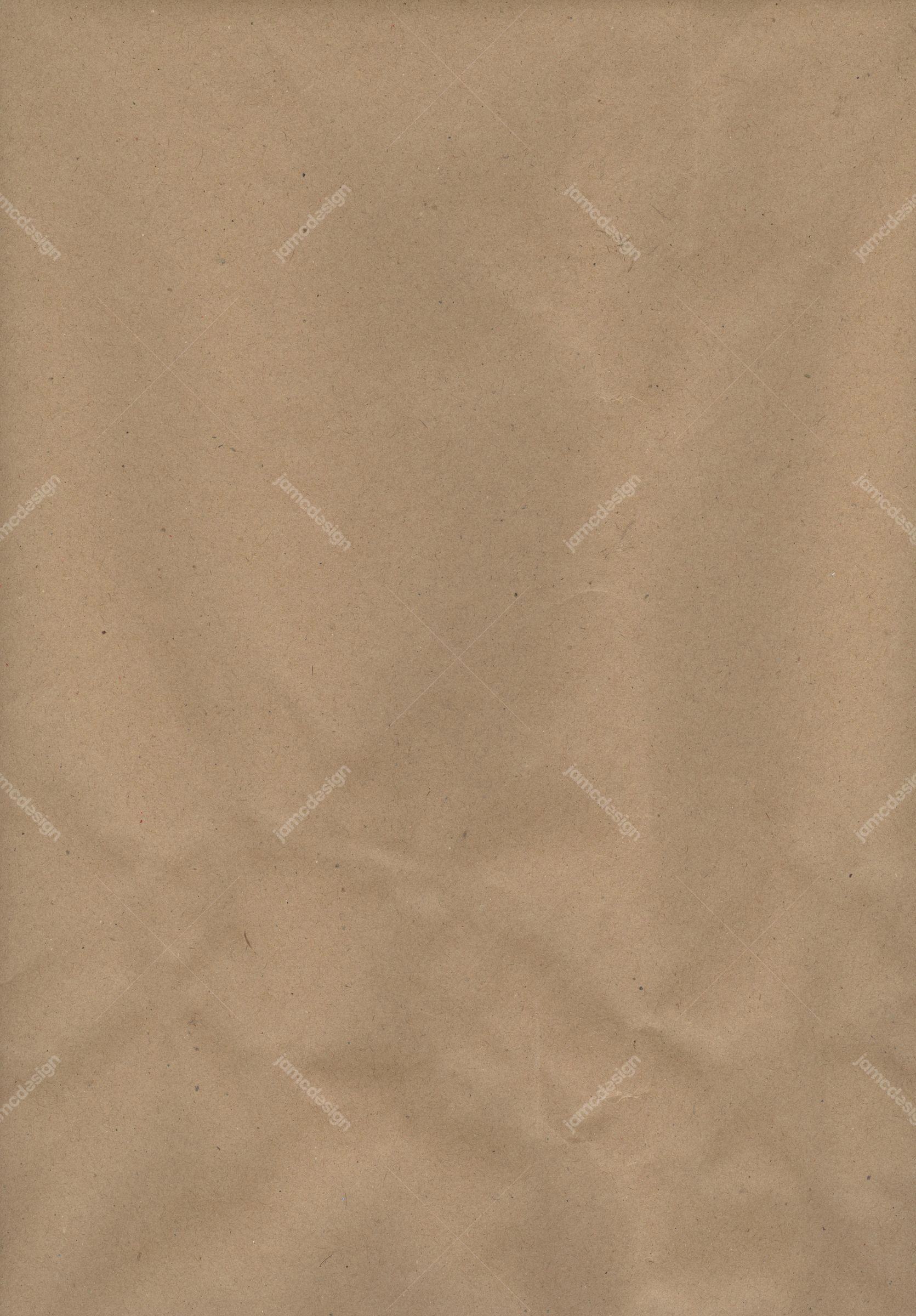 Warm Tan Mottled Paper Texture Background. A warm tan paper texture JPG with a softly mottled, lightly wrinkled surface and fine speckling