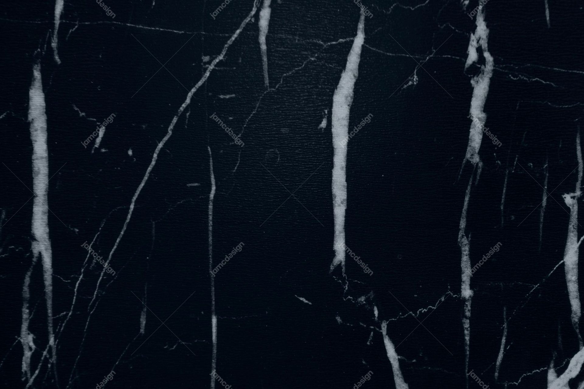 Near-Black Marble Background With Pale Veins. This dark marble texture JPG shows a near black stone surface crossed by irregular pale veins and fine cracks