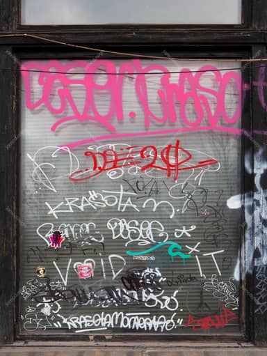 Graffiti-Covered Ribbed Window Texture PNG