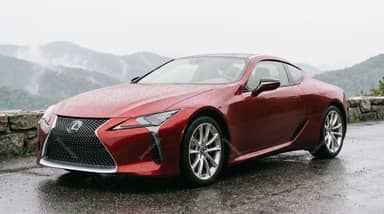 Red Lexus LC 500 Coupe With Misty Mountain Views