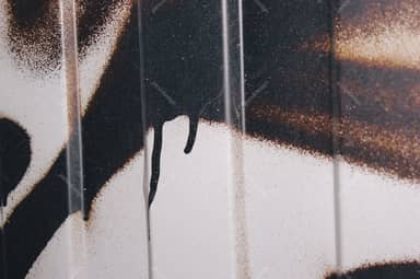 Dripping Spray Paint On A Pale Surface Texture