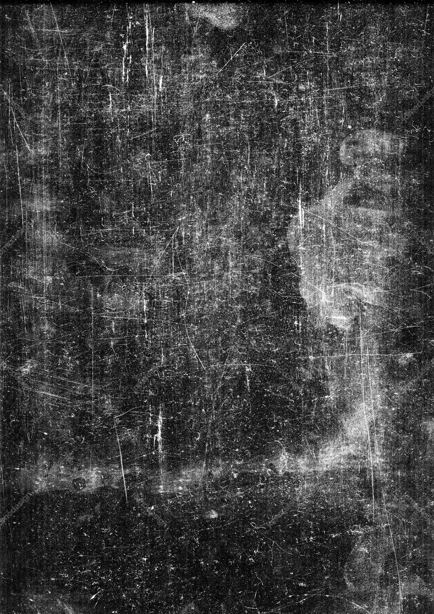 Dark Scratched Grunge Texture. This monochrome JPG texture features dense scratches, grain and pale brushlike streaks over a dark surface