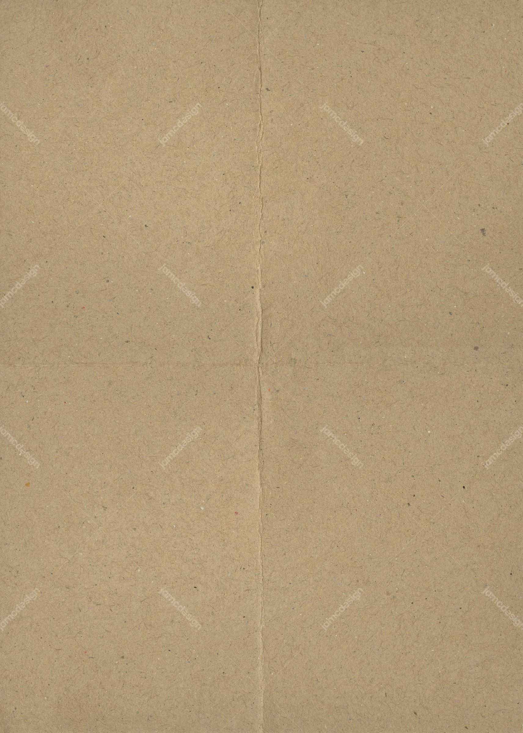 Speckled Tan Paper Texture With Vertical Crease. This JPG paper texture has a tan, softly speckled surface and a single crease