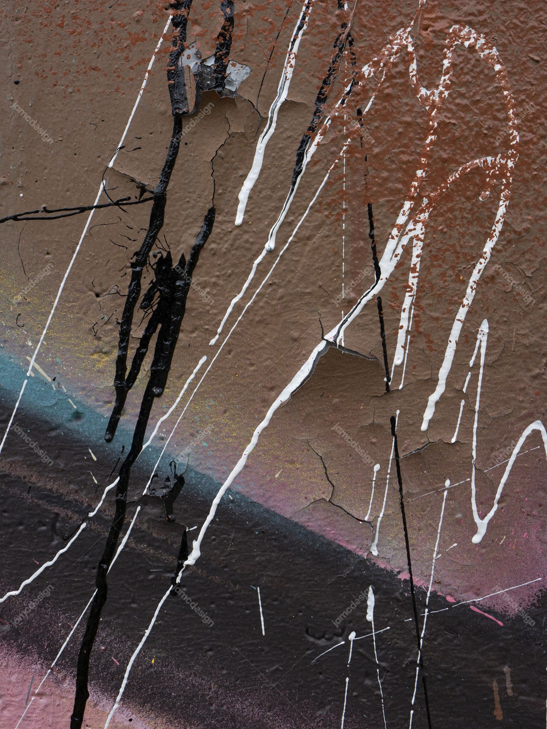 Weathered Wall Texture With Paint Streaks PNG. Download this PNG wall texture showing weathered brown and charcoal surfaces
