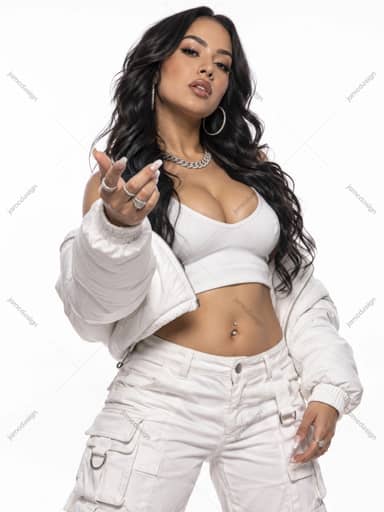 Confident Woman In White Crop Top And Cargo Trousers