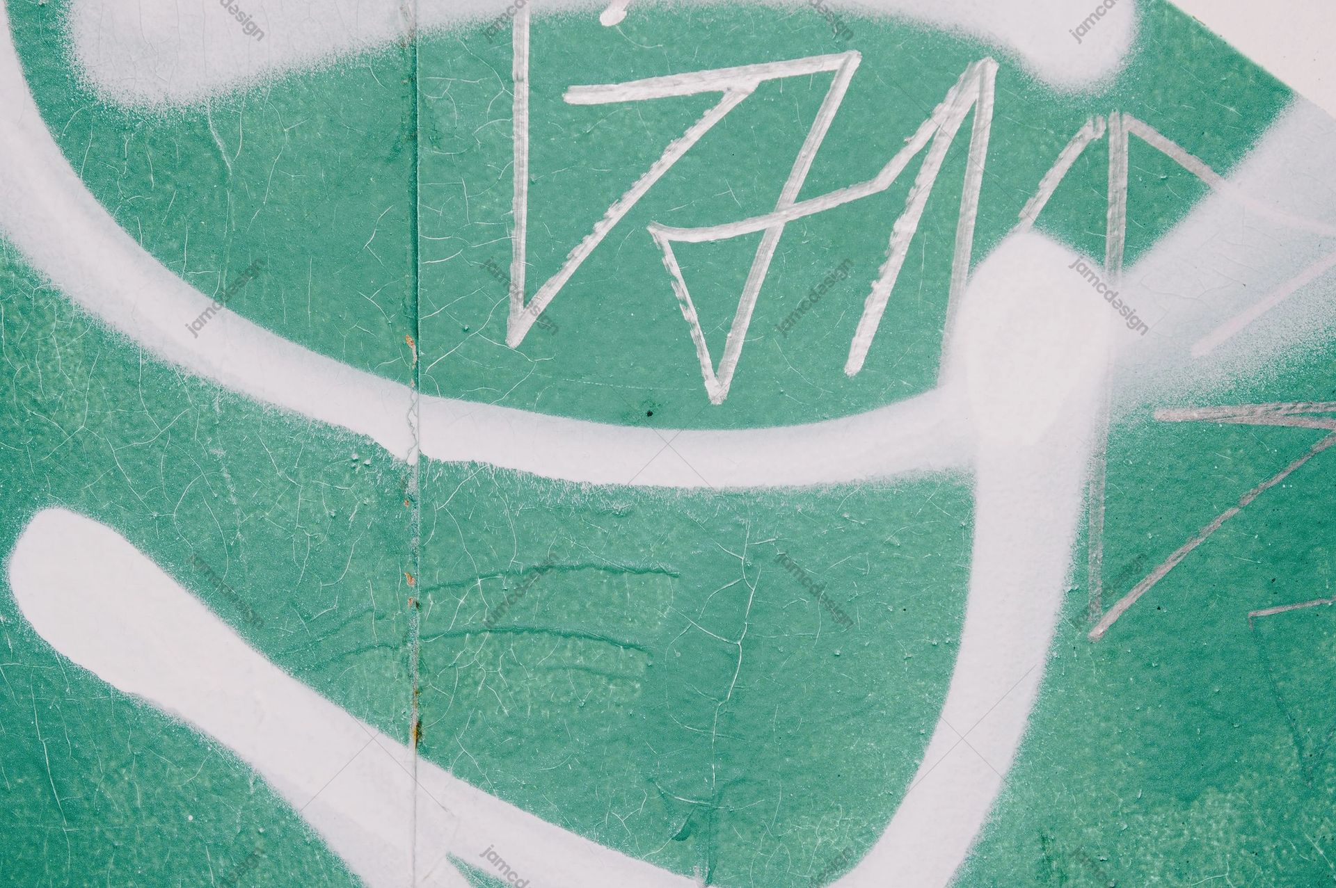 Mint Green Wall Texture With White Graffiti. Download this JPG texture of a mint green painted wall, marked by broad white graffiti lines
