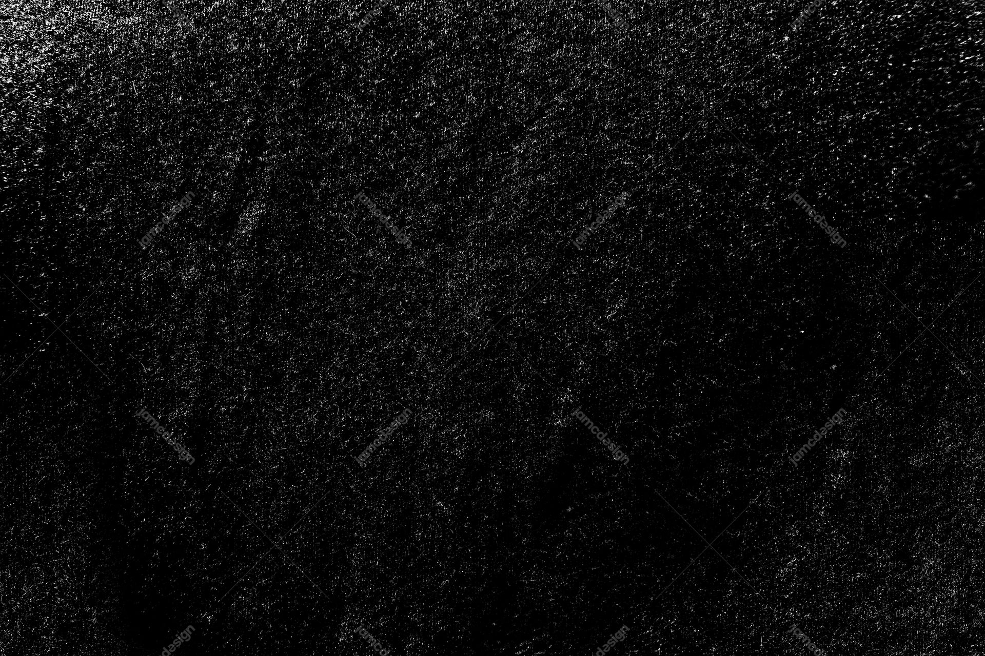 Near-Black Fine Grain Texture PNG. This PNG texture has a near black surface covered in fine, uneven pale grain and scattered distressed speckles