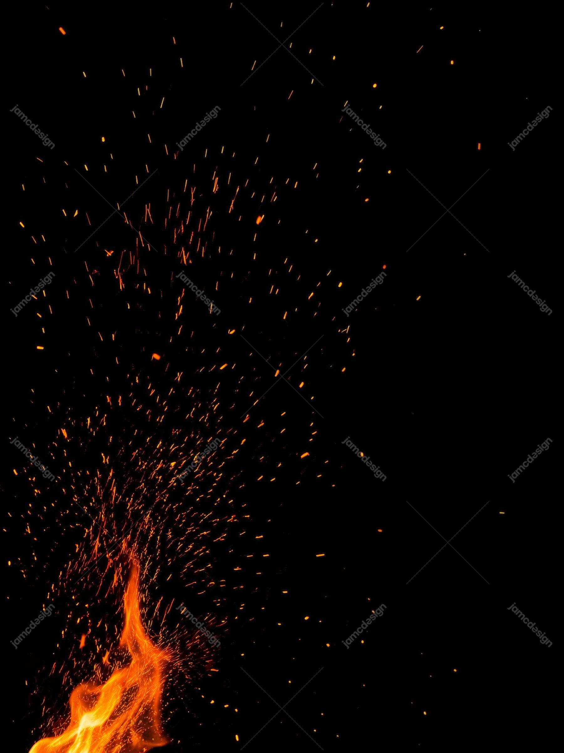Floating Fire Embers On Black Orange Flame Burst Background Texture. JPG texture showing a realistic burst of orange flames and glowing fire sparks rising