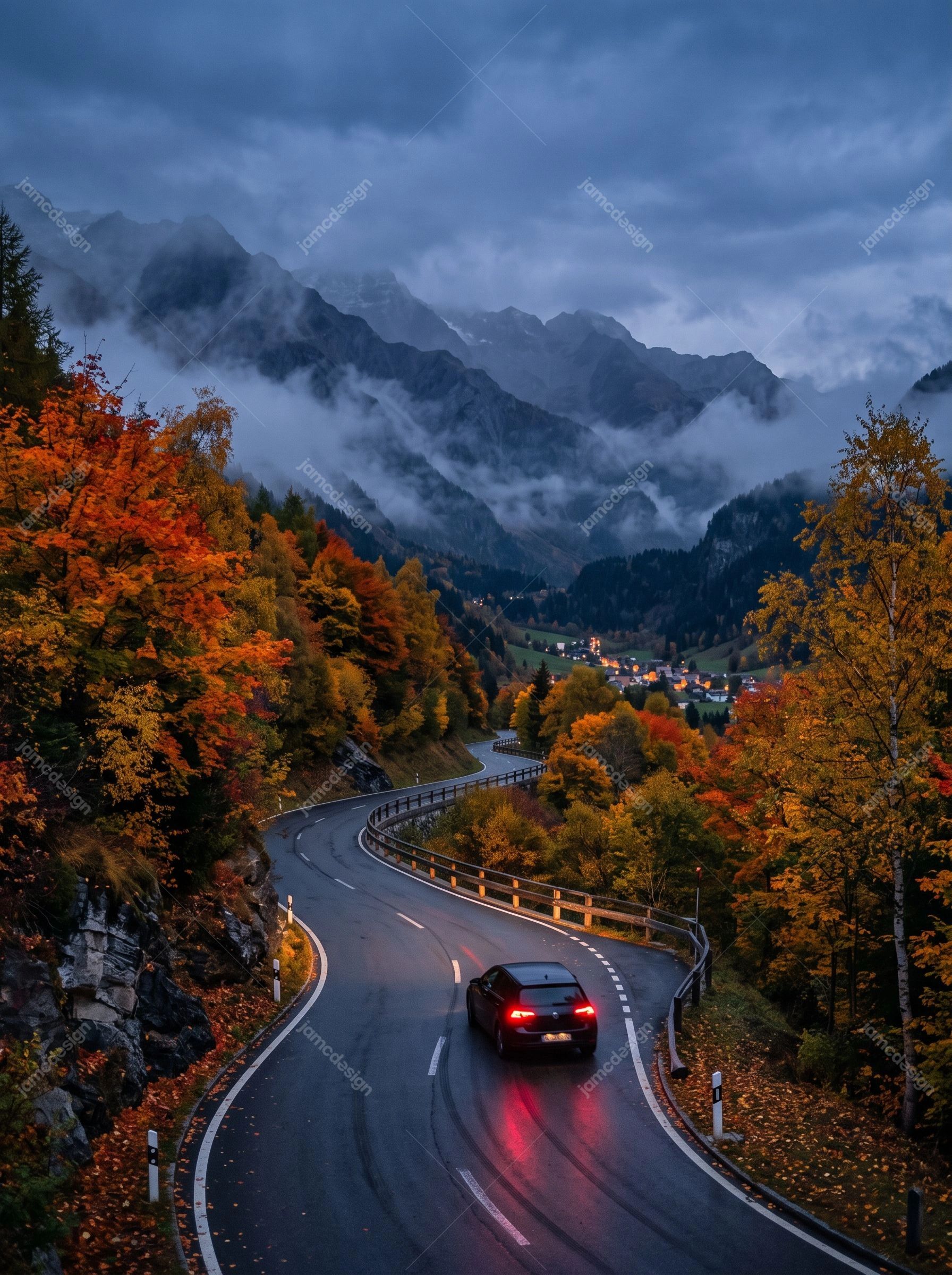 Carro Em Uma Estrada De Montanha Panorâmica. Baixe esta foto JPG de um carro percorrendo uma estrada montanhosa sinuosa