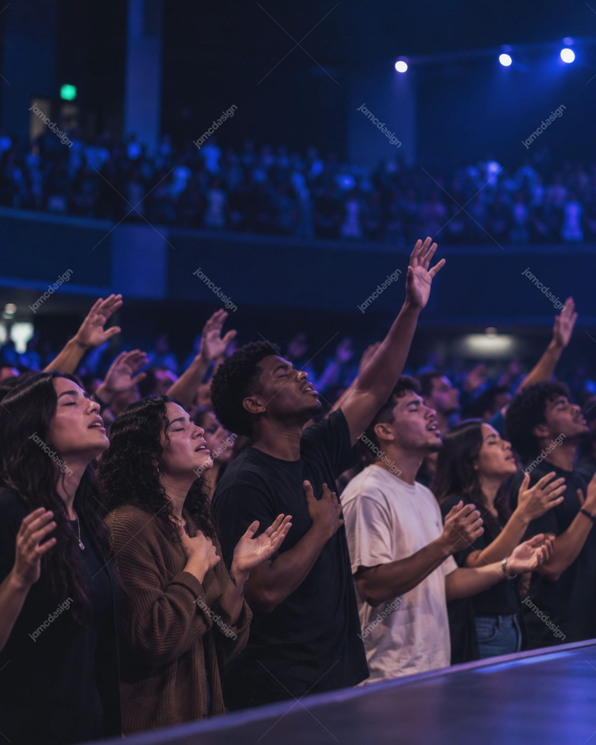 Photo Of Young Christians Worshiping In Church. Download this PNG photo of young Christians worshiping together, with raised hands