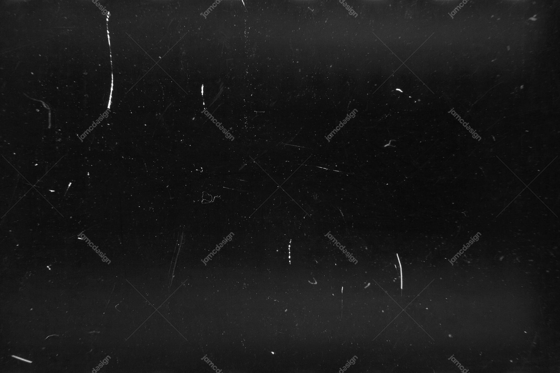 Black Grain Texture With Scattered Scratches. This JPG texture has fine dust speckles and scattered scratches across a dark, grainy black surface