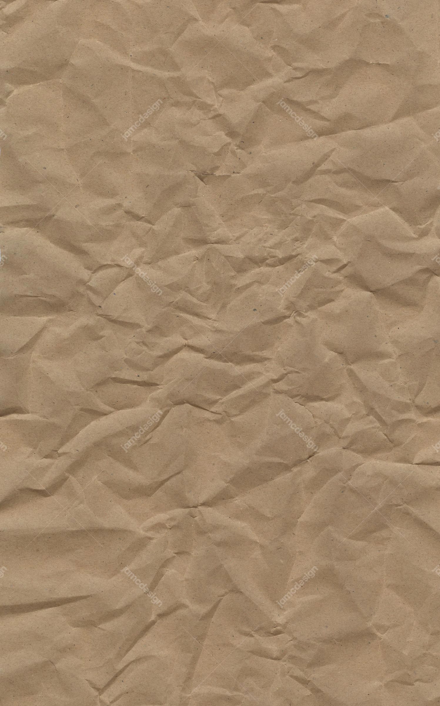 Heavily Rumpled Tan Paper Background. This JPG texture shows tan paper covered in deep, irregular crumples and soft natural shading
