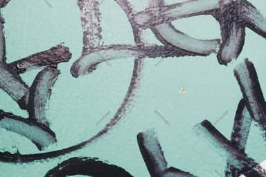 Turquoise Concrete Texture With Dark Graffiti