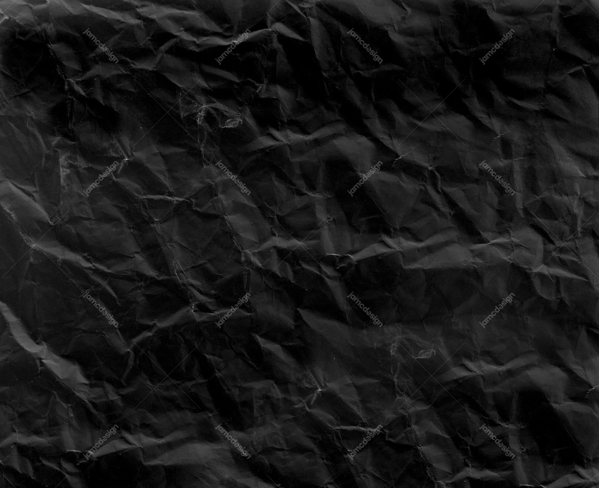 Black Paper Texture With Angular Folds. This JPG texture shows black crumpled paper with angular folds