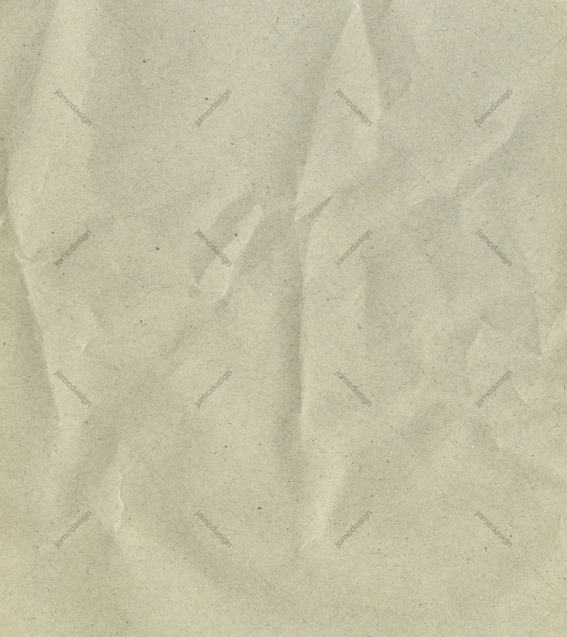 Pale Beige Paper Texture With Broad Folds. This JPG wrinkled paper texture shows a pale beige, softly mottled surface with broad creases and fine speckling