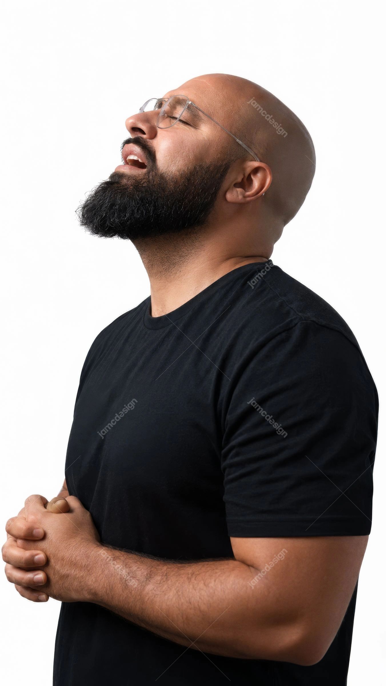 Bearded Man Praying With Eyes Closed Portrait. JPG photo of a bearded man with closed eyes and clasped hands