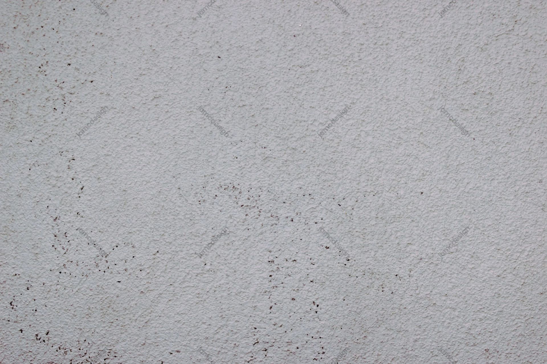 Fine-Grained Light Gray Plaster Texture. This light gray plaster texture JPG has a fine, uneven grain with scattered dark specks and a softly distressed