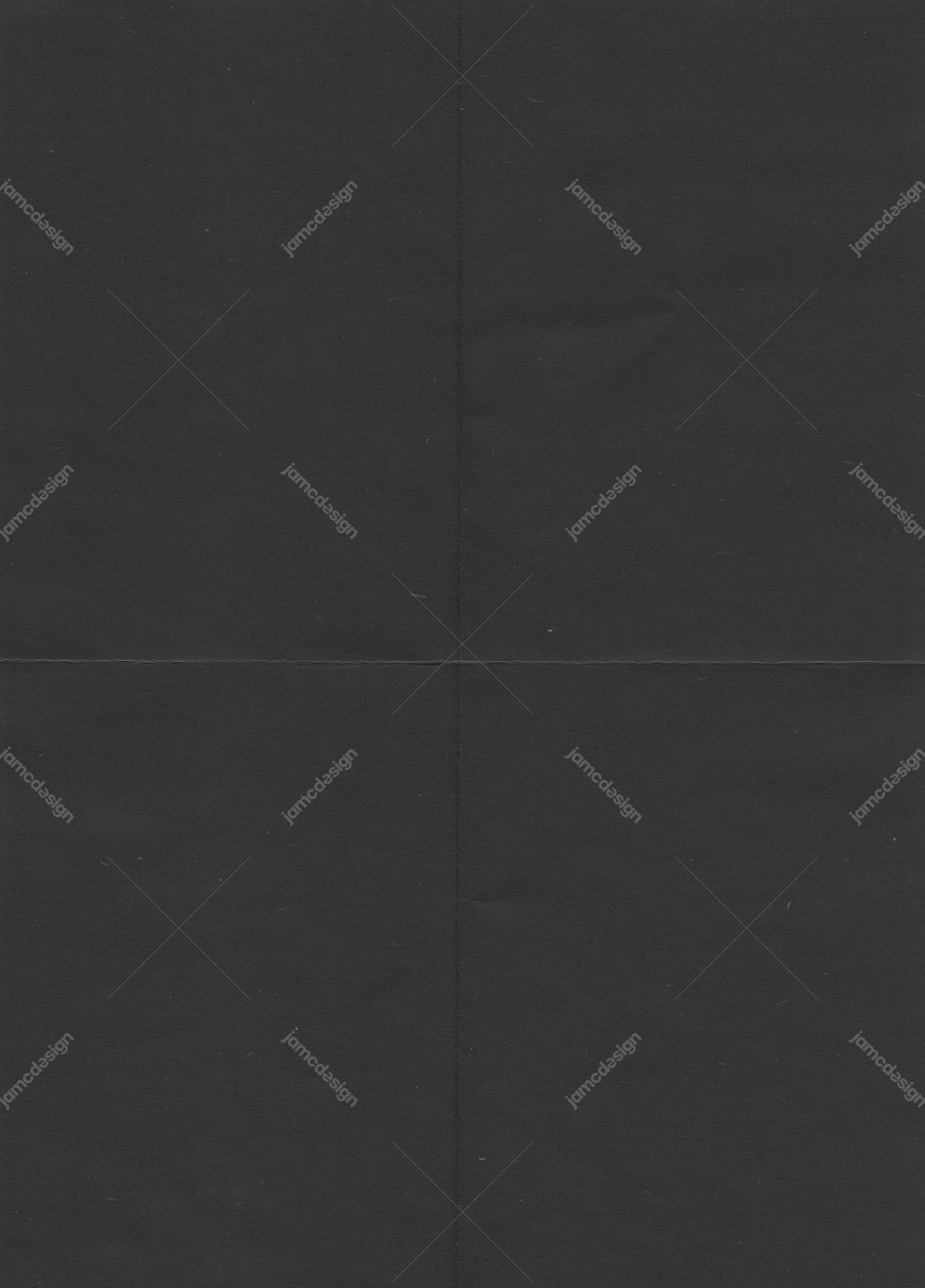 Charcoal Fabric Folds Texture Background. A dark charcoal fabric texture JPG shows a softly grainy surface with broad folds and faint crossing creases