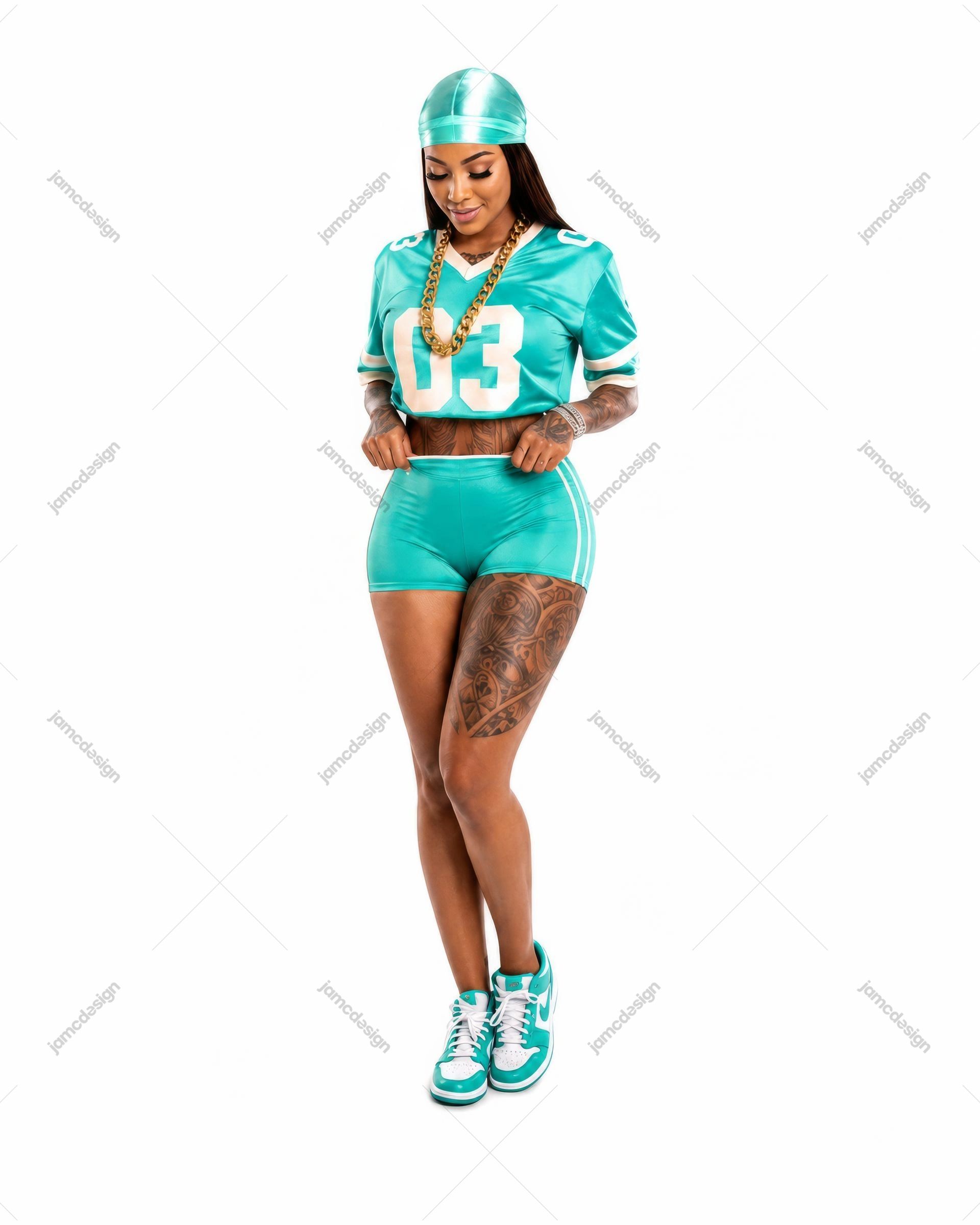 Urban Woman In Turquoise Sports Outfit Portrait. JPG photo of a woman posing in a turquoise sports outfit with matching cap and sneakers