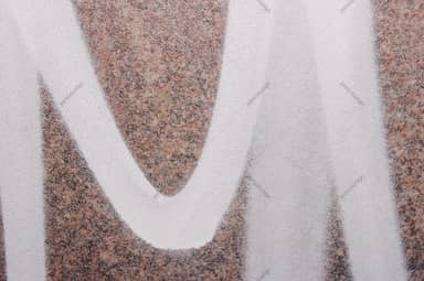 Speckled Concrete Texture With White Graffiti Curves