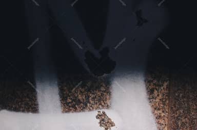 Dark Grunge Texture With White Spray Paint And Brown Stains