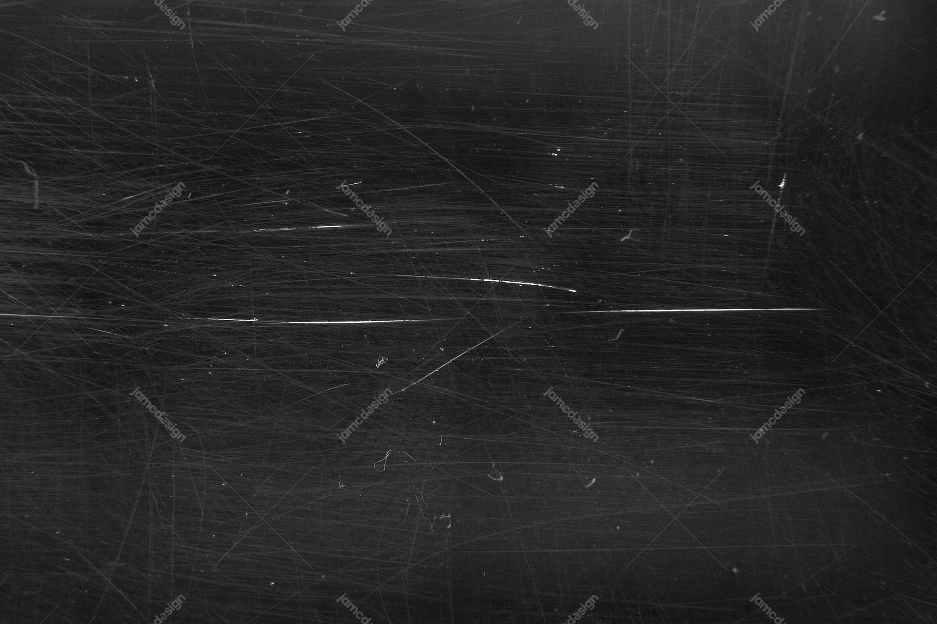 Dark Texture With Intersecting Scratches. This dark monochrome JPG texture combines brush grain with fine intersecting scratches and scattered scuffs