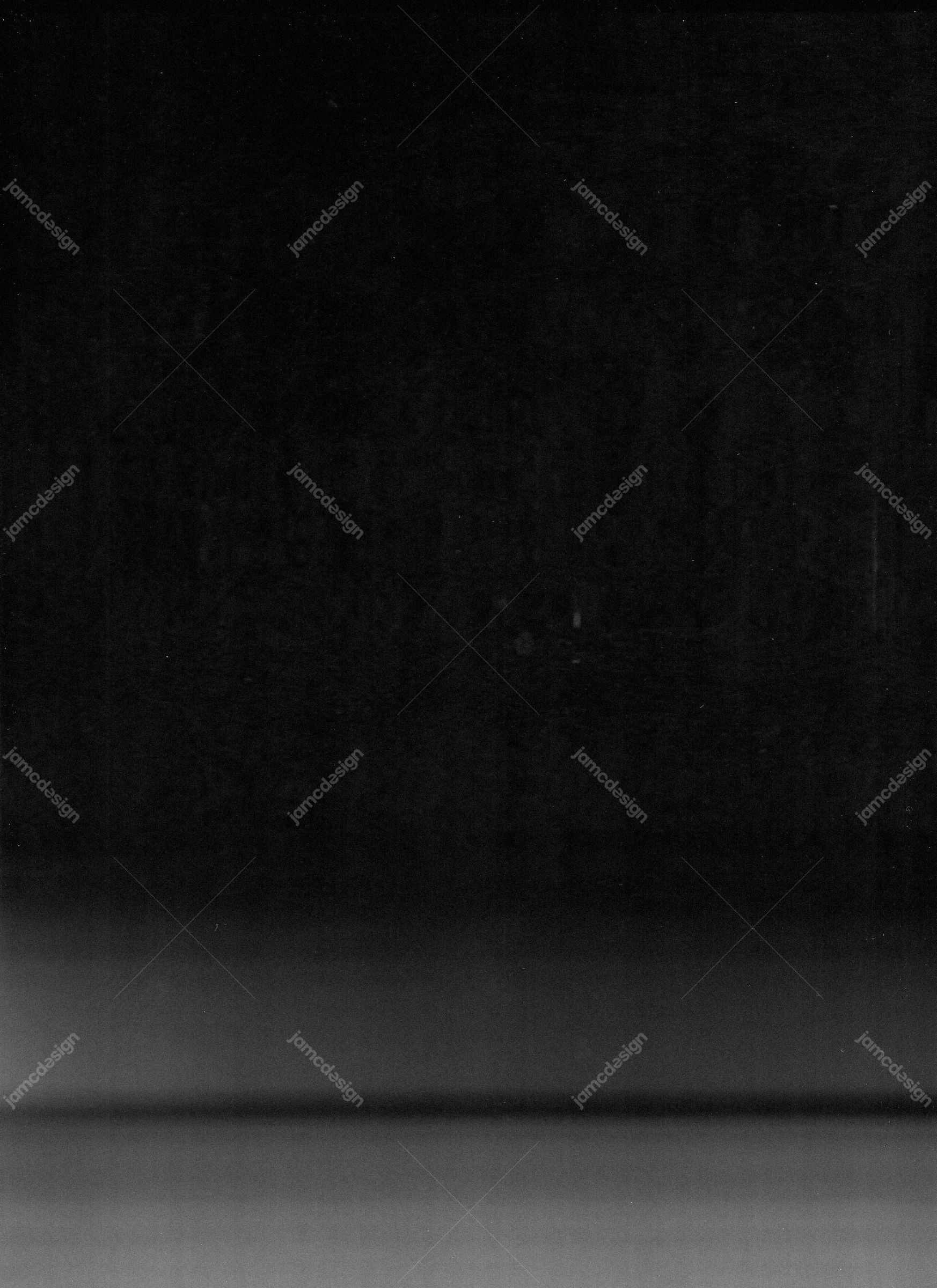 Dark Textured Background With A Gray Lower Band. This JPG texture features a dark charcoal field fading into a soft gray band