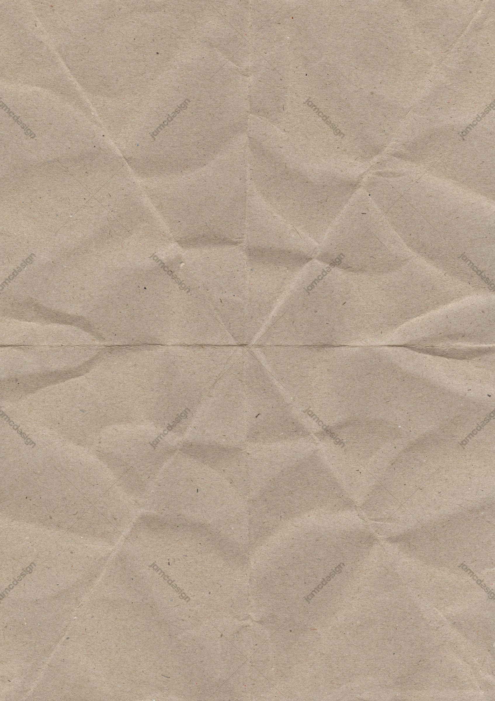 Beige Crumpled Paper Texture With Angular Creases. This JPG paper texture shows a beige, fibrous surface with fine speckles