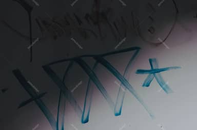 Faded Graffiti On Gray Wall Texture
