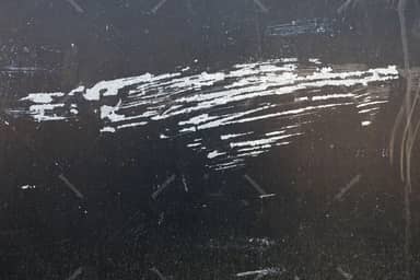 Dark Surface Texture With White Paint Streaks