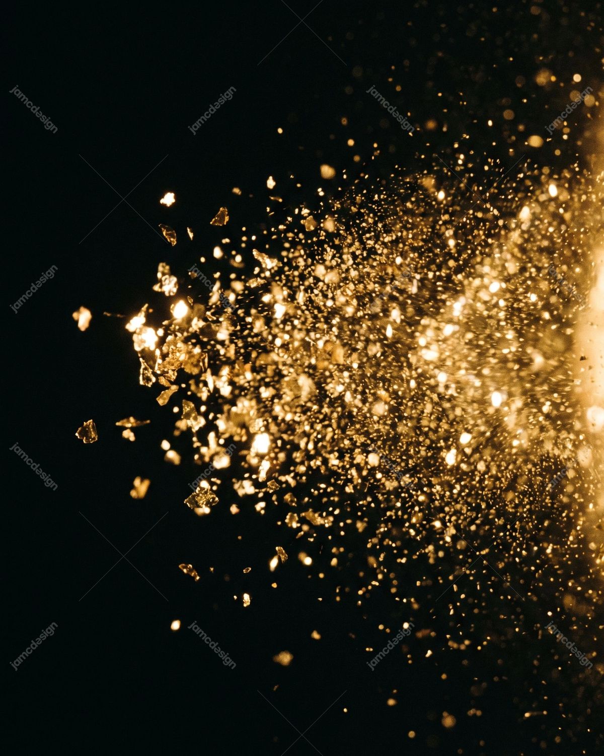 Golden Glitter Explosion Photo On Dark Background