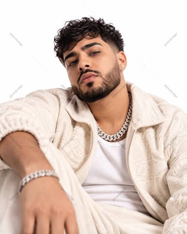 Bearded Man In Cream Outfit Portrait